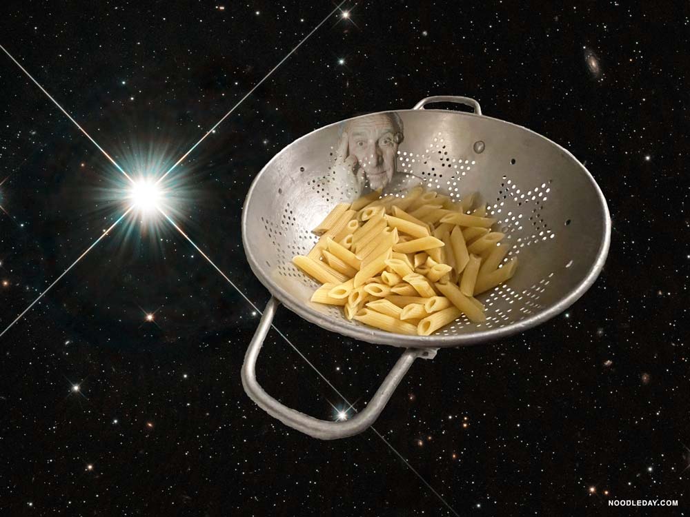 A picture of outer space, with a star flare and many stars in the background. In the front is a colander like a spaceship, angled to show it is holding noodles, and on the back, peeking above the noodles is a picture of Raymond Federman giving the finger.